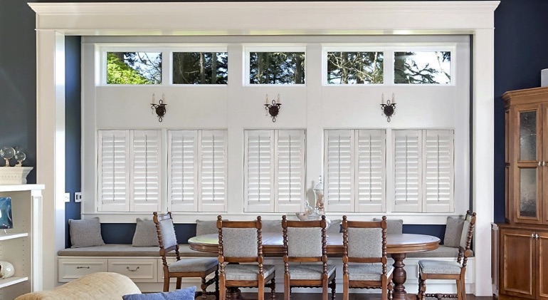 Phoenix great room with white plantation shutters.